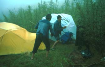 Pitching camp on a wind-blown ridge, Da Yang Tian